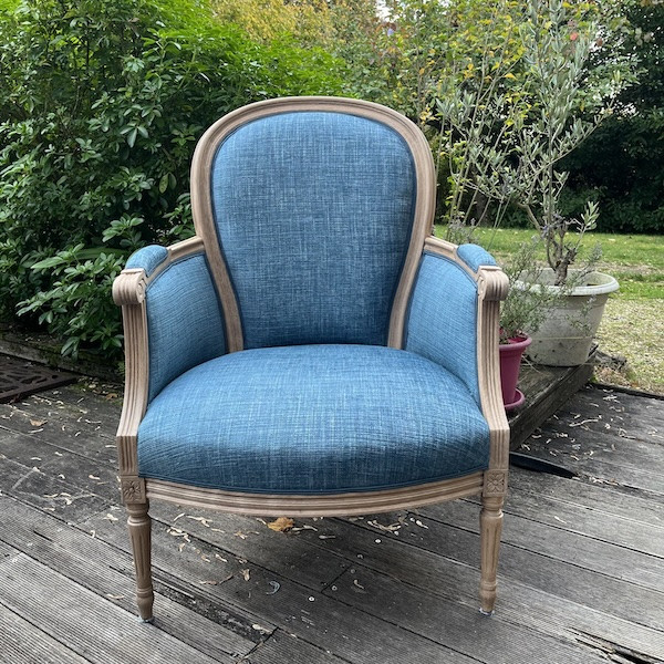 Paire de bergères de style Louis XVI